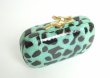 画像1: 【キャサリン妃、ジェシカアルバご愛用】Diane von Furstenberg 　Lytton Small Printed Snake Clutch (1)